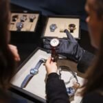 Visitors viewing luxury watches on display at Watches and Wonders Geneva 2025
