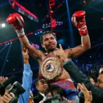 Professional Boxer Manny Pacquiao celebrating with the WBO International belt after defeating Brandon Ríos in November 2013.