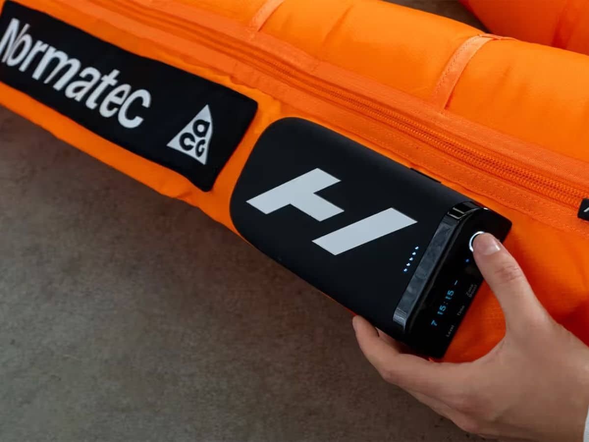 Hyperice x Nike ACG Normatec Elite control module with ACG branding.