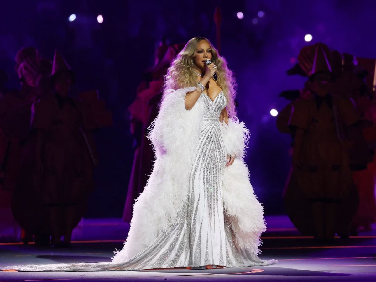 Mariah Carey performs at the Milano Cortina 2026 Winter Olympics opening ceremony at San Siro Stadium.