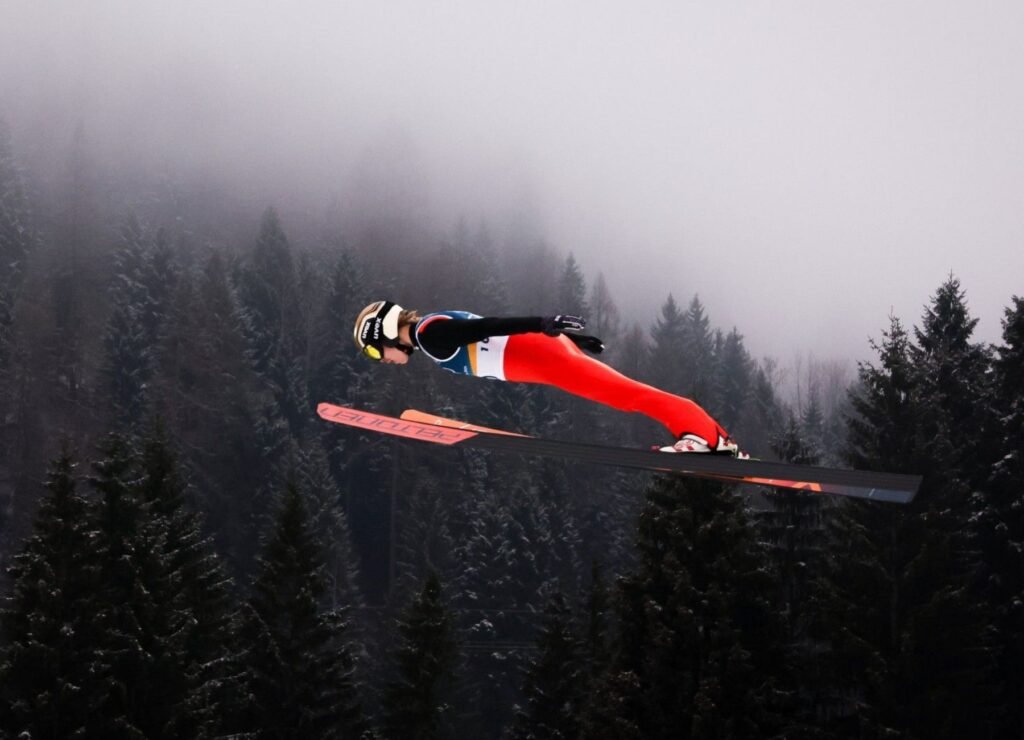 Finland's Wille Karhumaa competes in the men's ski jumping event at the Olympic Winter Games Milano Cortina 2026.