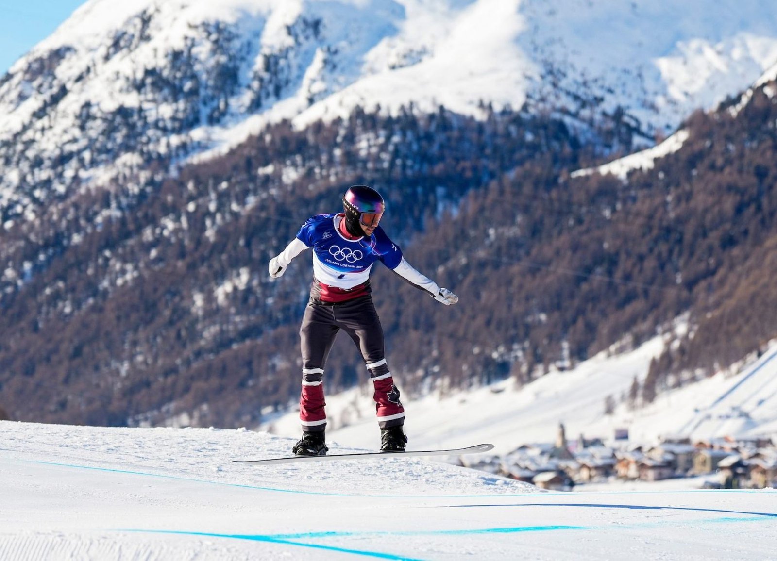 Canada's Éliot Grondin competes in the men's snowboard cross event at the Olympic Winter Games Milano Cortina 2026 in Livigno.