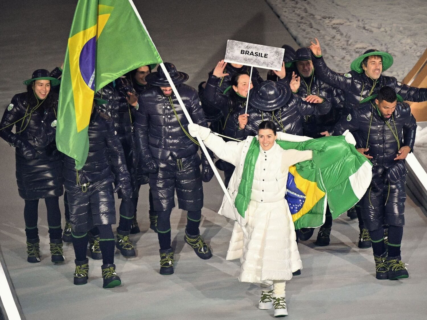 Lucas Pinheiro Braathen and Team Brazil in Moncler uniforms at the Milano Cortina 2026 Winter Olympics opening ceremony.